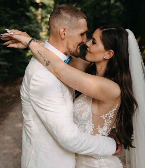 Alicia Andrich with her husband Robert Andrich on their wedding day